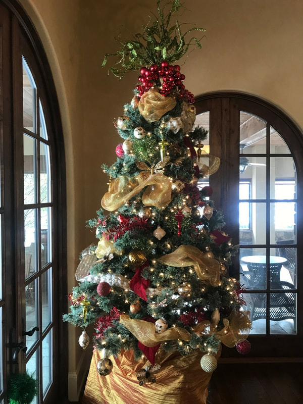 closeup of lavishly decorated pine tree