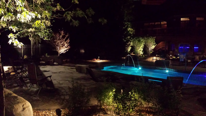 pool lit up at night 